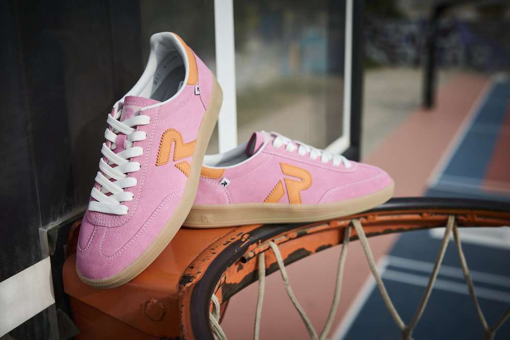 a pair of pink Rieker Sport shoes on a basketball hoop